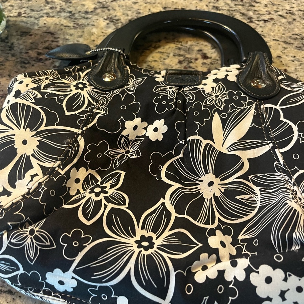 Black and White Floral Shoulder Bag with Artistic Design
